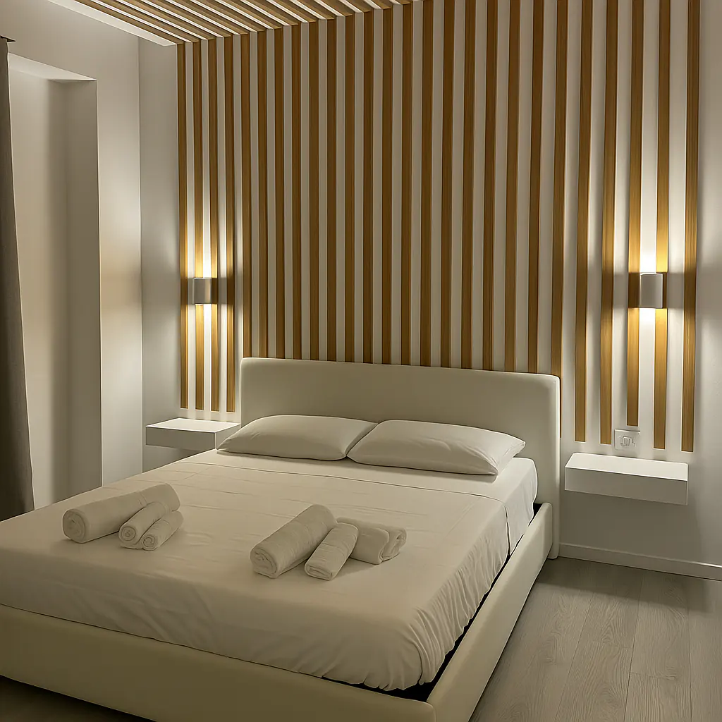 Camera da letto della Suite Prestige con vista mare